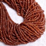 Crystal Quartz coated faceted gemstone rondelle