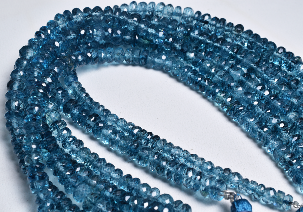 thumbnail image 2 of Natural Coated Blue Topaz Faceted Rondelle Beads – 33cm Strand, AAA Quality 2 of 3