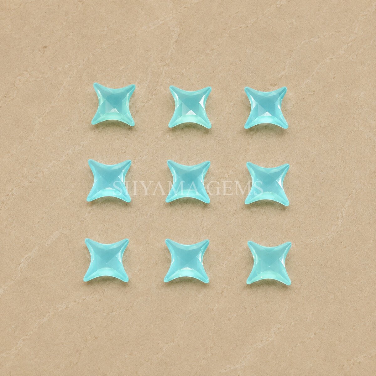 Aqua Chalcedony Carved Ninja Star Loose Gemstone 12mm Aqua Chalcedony Carved Ninja Star Loose Gemstone 12mm