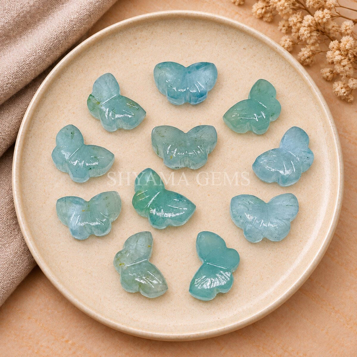 Aquamarine Hand Carved Butterfly Gemstone 13mm Aquamarine Hand Carved Butterfly Gemstone 13mm