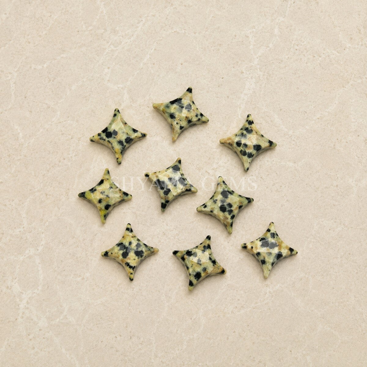 Dalmatian Jasper Carved Ninja Star Loose Gemstone 12mm Dalmatian Jasper Carved Ninja Star Loose Gemstone 12mm