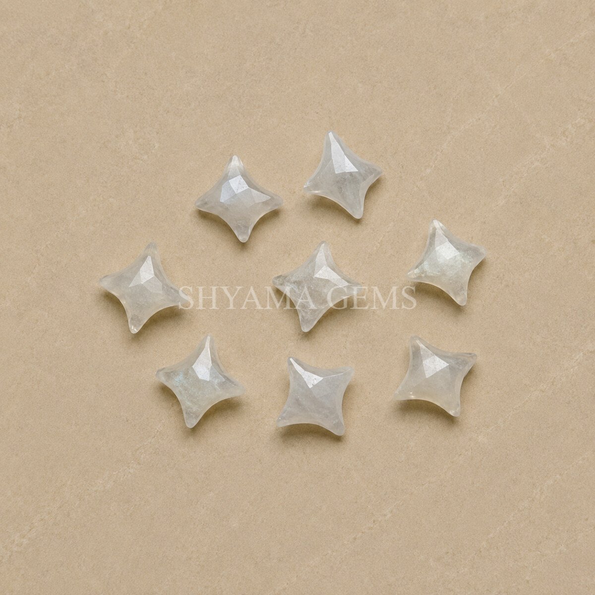 Grey Moonstone Carved Ninja Star Loose Gemstone 12mm Grey Moonstone Carved Ninja Star Loose Gemstone 12mm