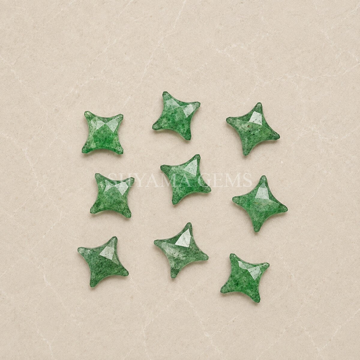 Green Strawberry Quartz Carved Ninja Star Loose Gemstone 12mm Green Strawberry Quartz Carved Ninja Star Loose Gemstone 12mm